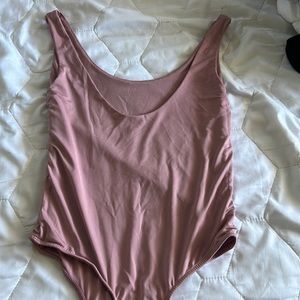 Body suit never worn